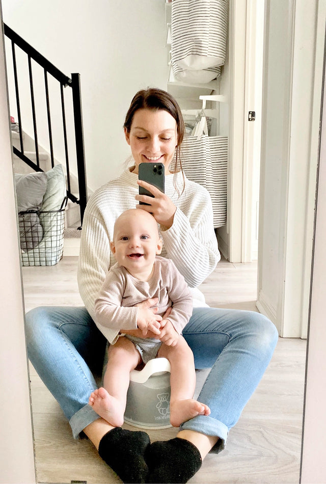 Erika Fraser Montessori potty training consultant helping her child develop potty independence.