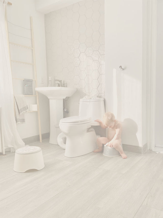 image of child on toddler potty chair